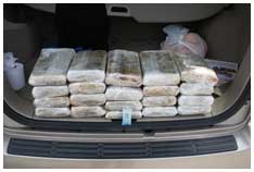 Cocaine concealed in a false compartment in the rear deck of an SUV