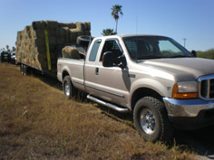 Truck towing a trailer on US 281 in San Manuel